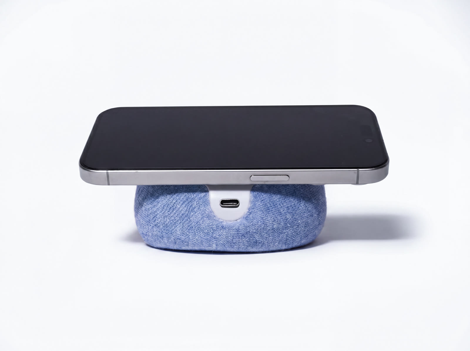 A phone resting flat on NEST