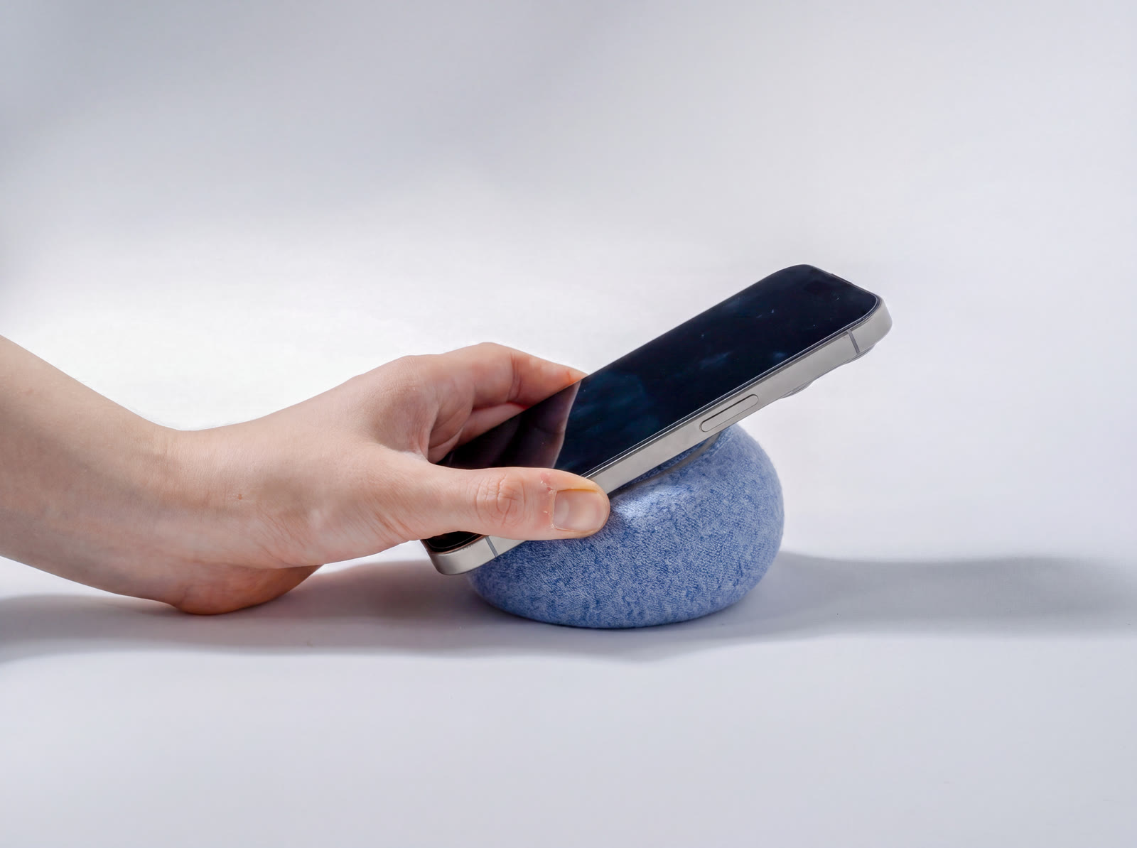 A phone slid onto NEST from the side